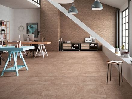 Camera in un loft moderno con piastrelle in gres porcellanato beige