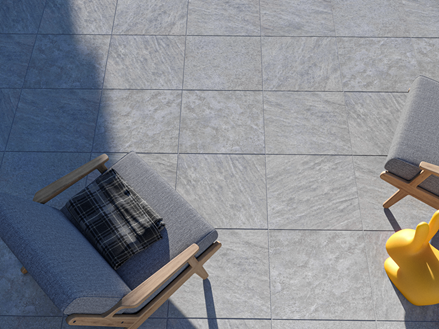 Lastra per patio in quarzite Classic Grey con mobili da esterno