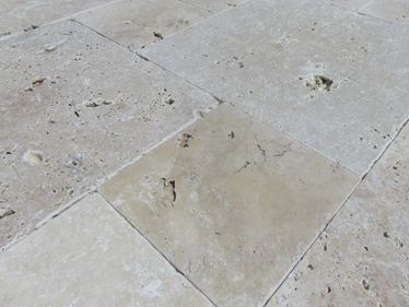 Primo piano delle piastrelle da terrazzo Ivory Cream
