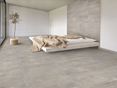 Look moderno ed elegante: Conrete Clay Camera da letto con piastrelle Concrete Clay in grigio chiaro, effetto cemento.