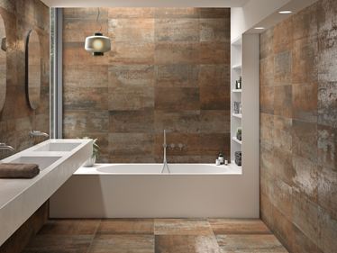 Bagno con piastrelle effetto cemento Iron Copper con effetto metallo