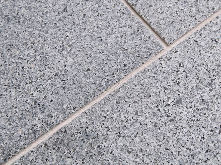 Lastre di granito grigio Mundo, primo piano