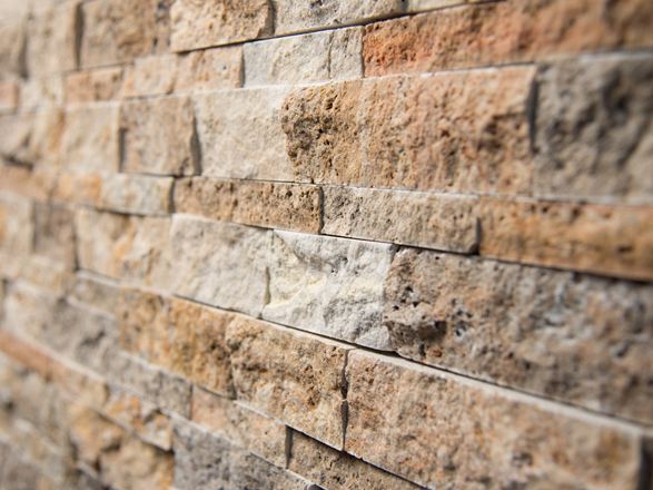 Primo piano del mattone di rivestimento della parete Scabas